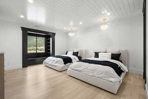 Bedroom featuring a chandelier, recessed lighting, wood finished floors, and wooden ceiling