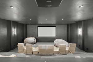 Carpeted cinema with recessed lighting