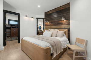 Bedroom featuring light wood-type flooring and recessed lighting