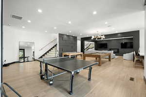 Recreation room featuring recessed lighting, light wood finished floors, and pool table