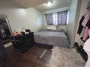 Downstairs Bedroom #3 featuring wood finished floors