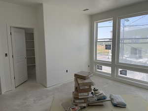 Empty room with a textured ceiling