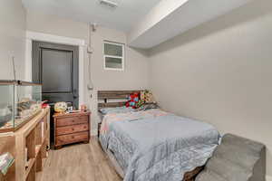 Bedroom featuring wood finished floors
