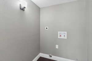 Laundry area with hookup for an electric dryer and hookup for a washing machine