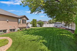 View of fenced backyard