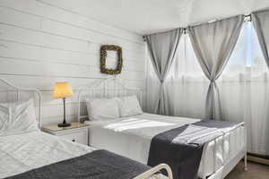 Bedroom featuring baseboard heating