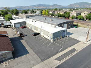 Aerial perspective of suburban area with a mountain backdrop