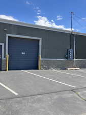 Garage featuring uncovered parking