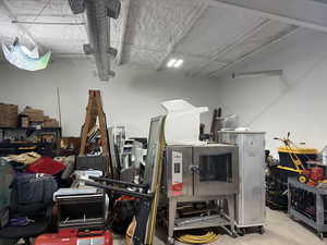 Garage featuring a workshop area