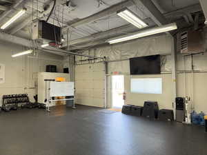 Garage featuring a heating unit