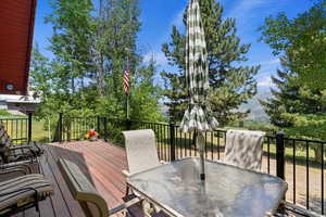 Wooden terrace with outdoor dining area