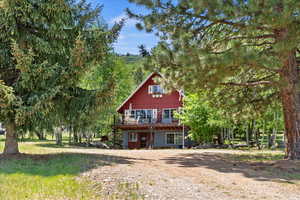 View of front facade featuring a deck