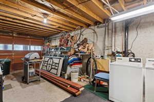 Basement featuring separate washer and dryer