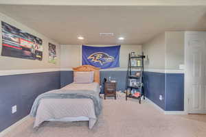 Bedroom featuring carpet and recessed lighting