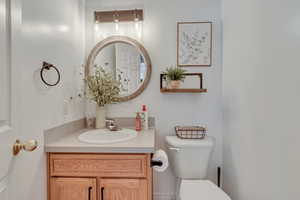 Bathroom with toilet and vanity