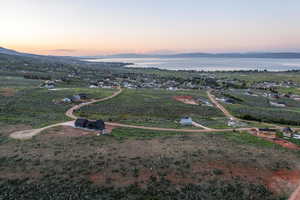 Aerial view at dusk of a water and mountain view