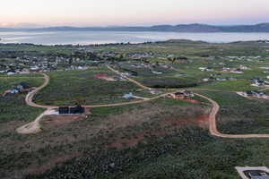 Aerial view at dusk of a water and mountain view