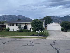 Ranch-style house with large yard, Mountain View, and Garage