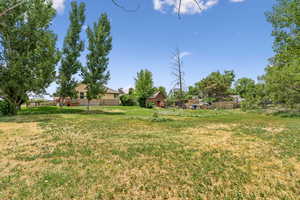 View of yard with a deck