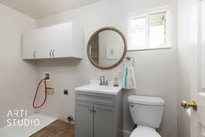 Bathroom with vanity and toilet