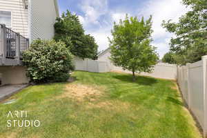 View of fenced backyard