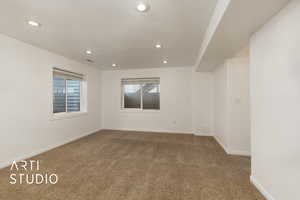 Spare room with carpet floors and recessed lighting