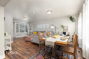 Dining area featuring wood finished floors