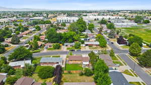 View of property location with nearby suburban area and mountains