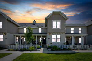 Featuring a fenced front area and classic curb appeal