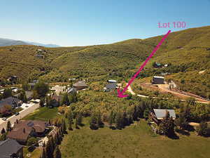 Aerial perspective of suburban area with mountains
