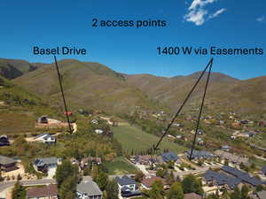 Aerial view of residential area featuring mountains