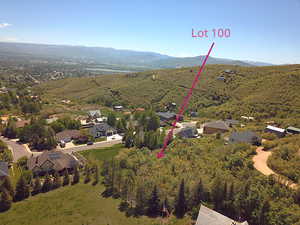 Aerial view of residential area with a mountainous background