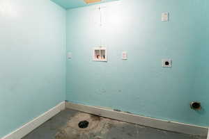 Laundry room with electric dryer hookup and washer hookup