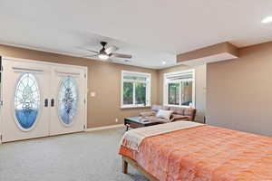 Bedroom with light colored carpet, access to outside, recessed lighting, and ceiling fan