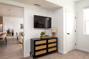 Corridor featuring baseboards