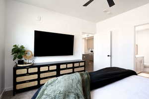 Bedroom featuring connected bathroom and ceiling fan