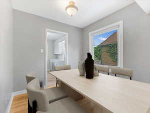 Dining area featuring light wood-style flooring