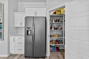 View of pantry near fridge