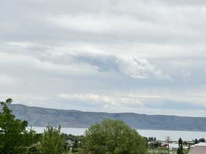 View of mountain backdrop with a nearby body of water