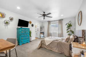 Bedroom featuring carpet floors, recessed lighting, ceiling fan, and connected bathroom