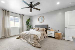 Bedroom featuring carpet floors, recessed lighting, and ceiling fan