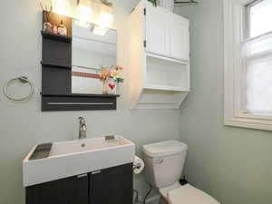 Bathroom featuring toilet and vanity