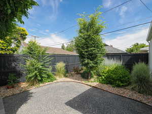 Fenced backyard featuring a patio area