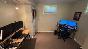 Office featuring carpet and baseboards