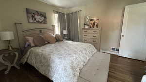 Bedroom featuring wood finished floors