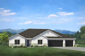 View of front facade with stone siding, a garage, a mountain view, and a front yard