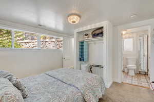 Unit B - Back bedroom with direct access to the bathroom and laundry.