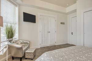 Unit B - main bedroom.  The french doors open to the other bedroom