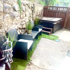 Fenced side yard accessible by the gates or stairs leading from the lower unit.
