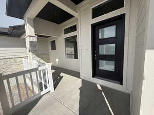 Property entrance featuring a porch